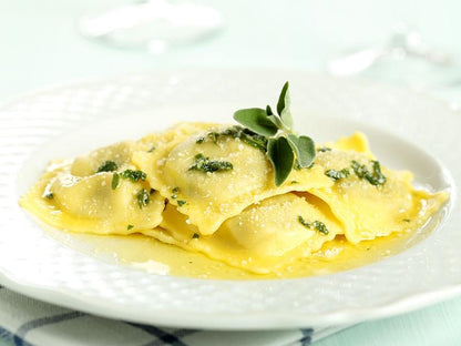 Tortelli finferli e salsiccia